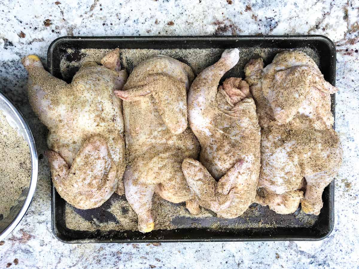 Rub seasoning over chicken