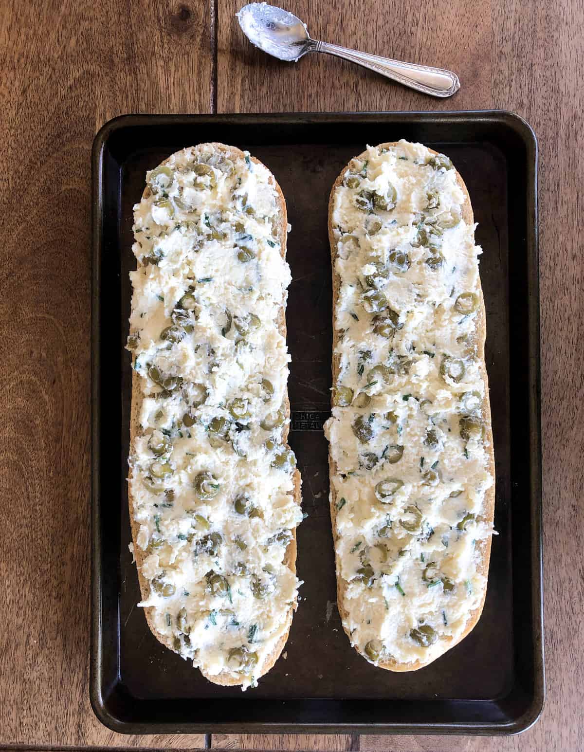 Spread the mixture onto both halves of the bread and bake in a 350-degree oven for 20 minutes.