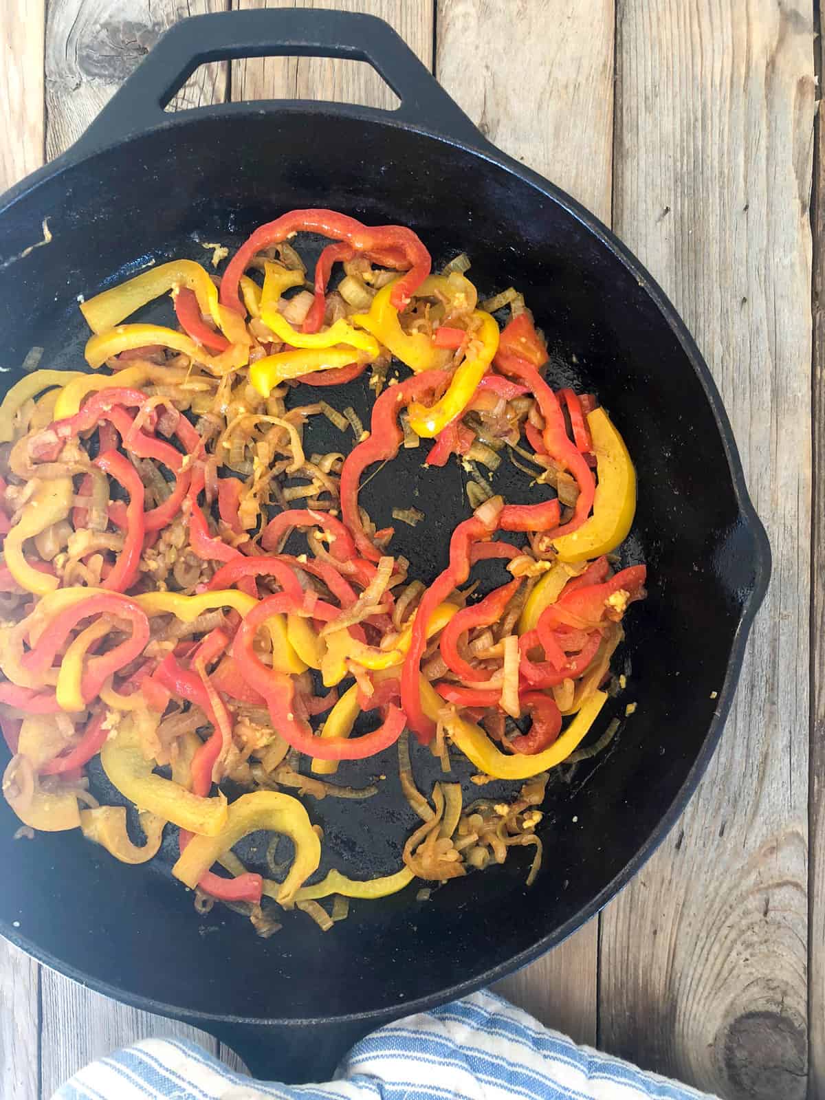 Chopped vegetables in skillet 