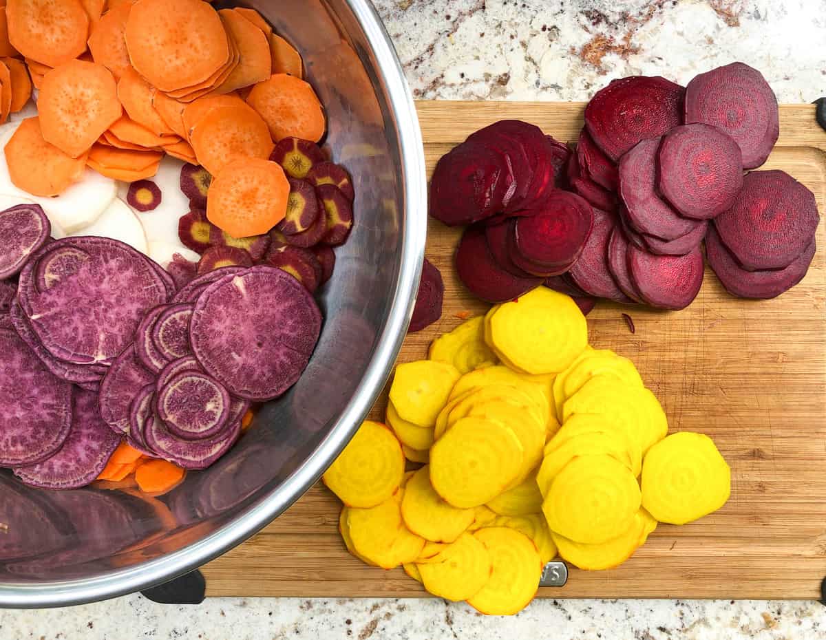 Sliced carrots, beets, rutabagas, and sweet potatoes.