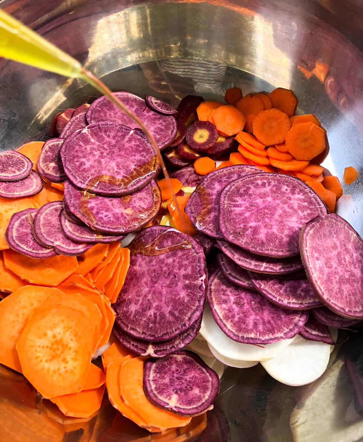 Coat carrots, beets, rutabagas, and sweet potatoes with olive oil