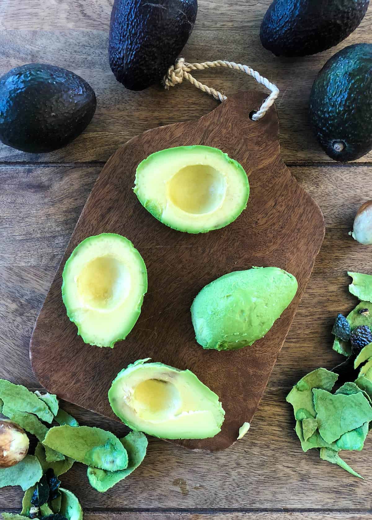 Halved and peeled avocados 