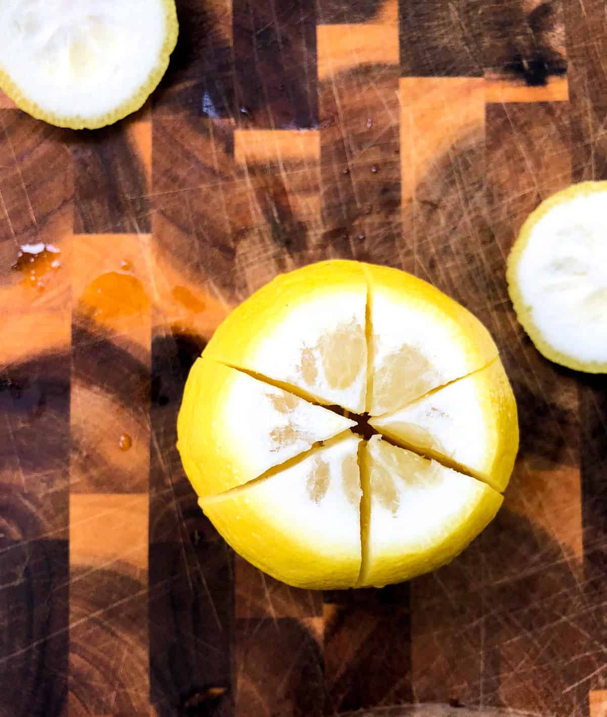 Make a star-shaped pattern at the top of each lemon.