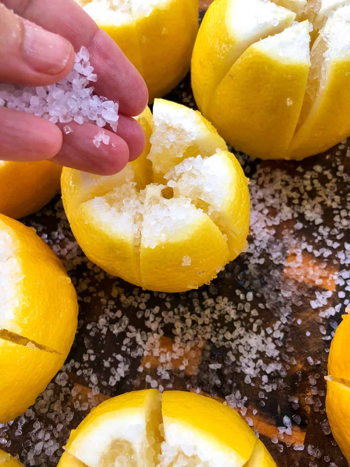 add coarse salt to the lemons.