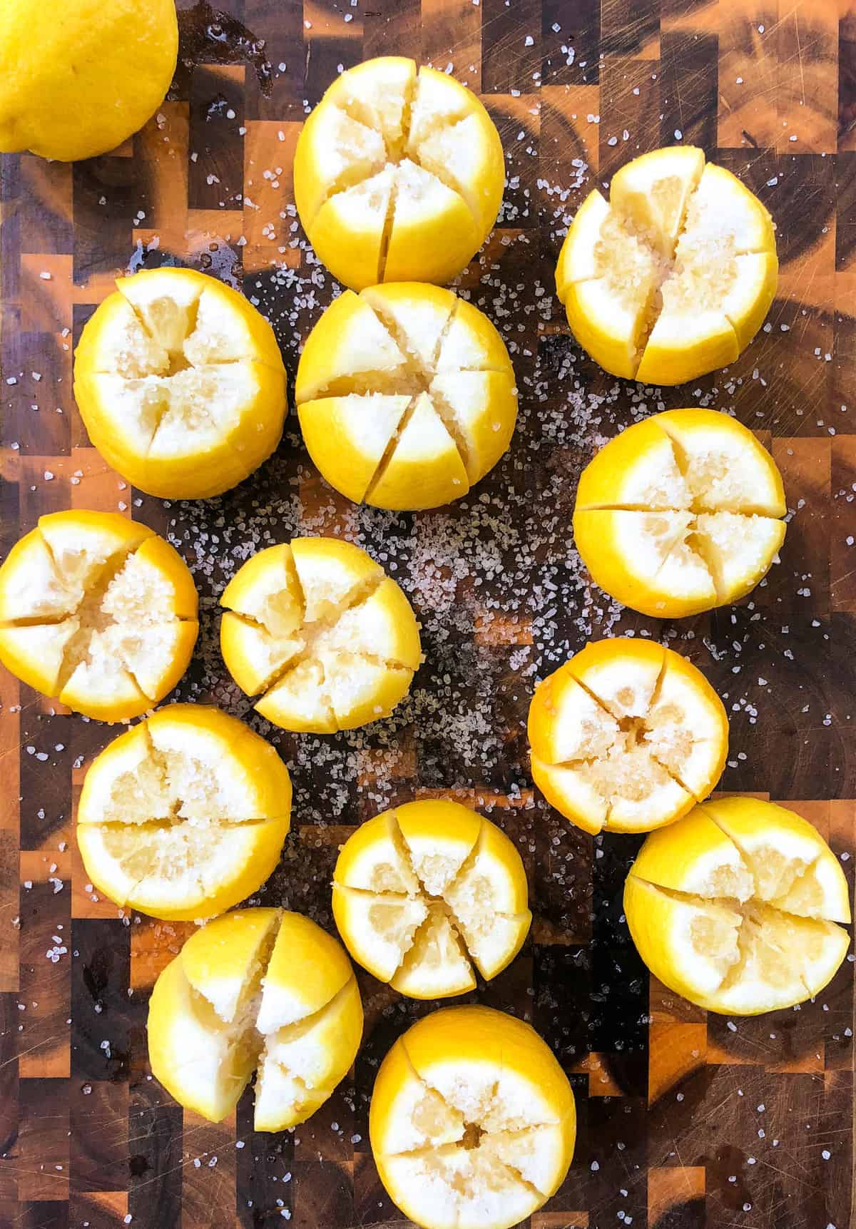 Add coarse salt to the lemons.