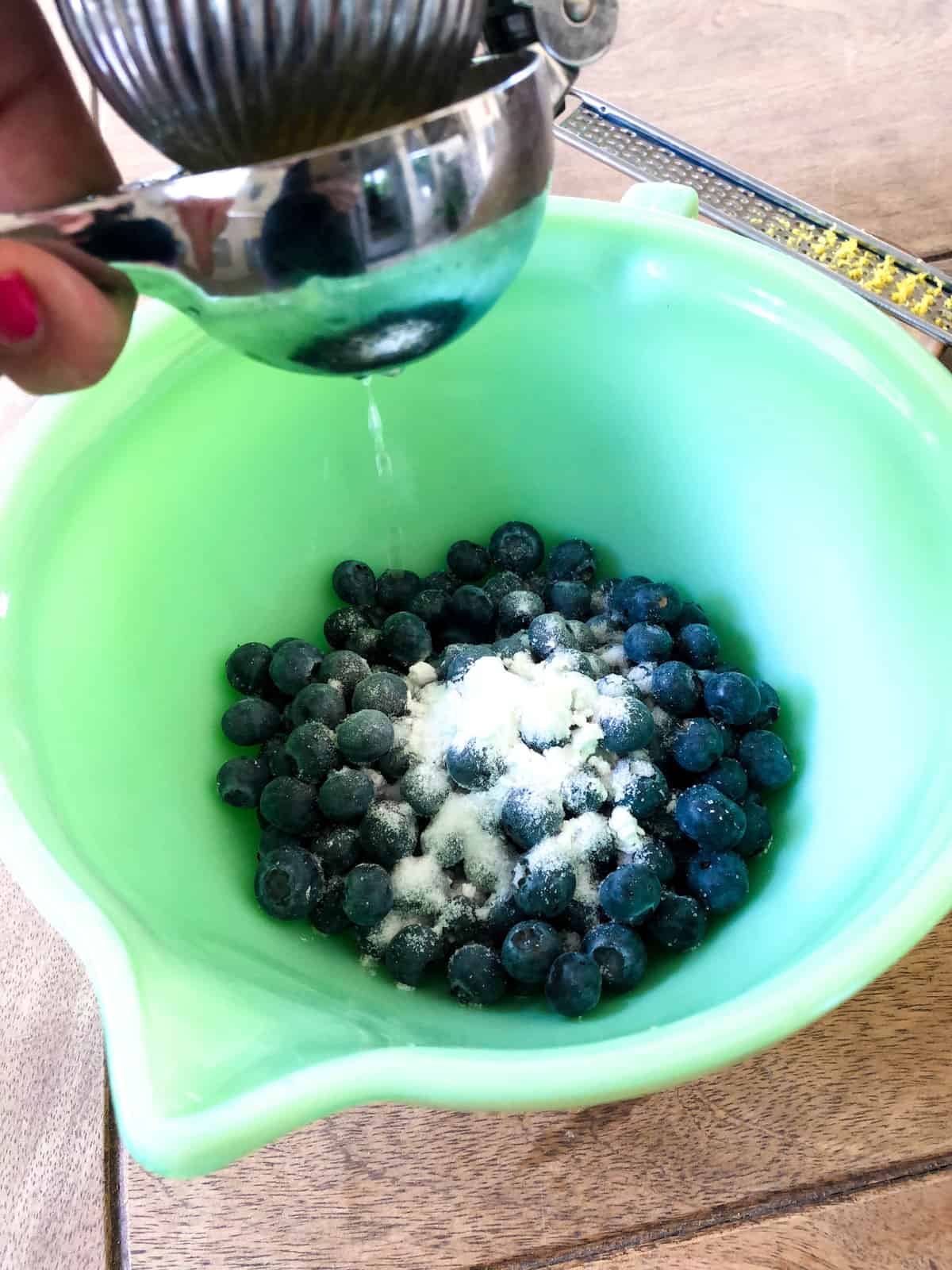 Squeeze lemon juice over blueberries
