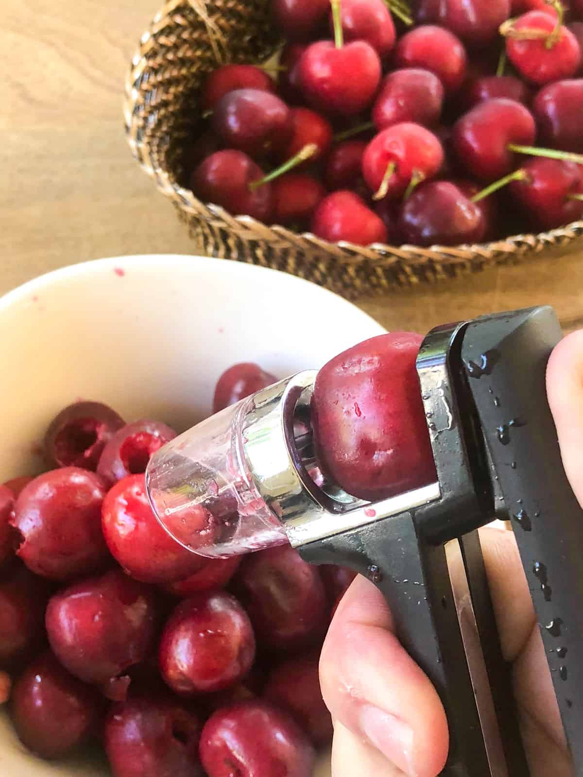 Remove the pit from the cherries.