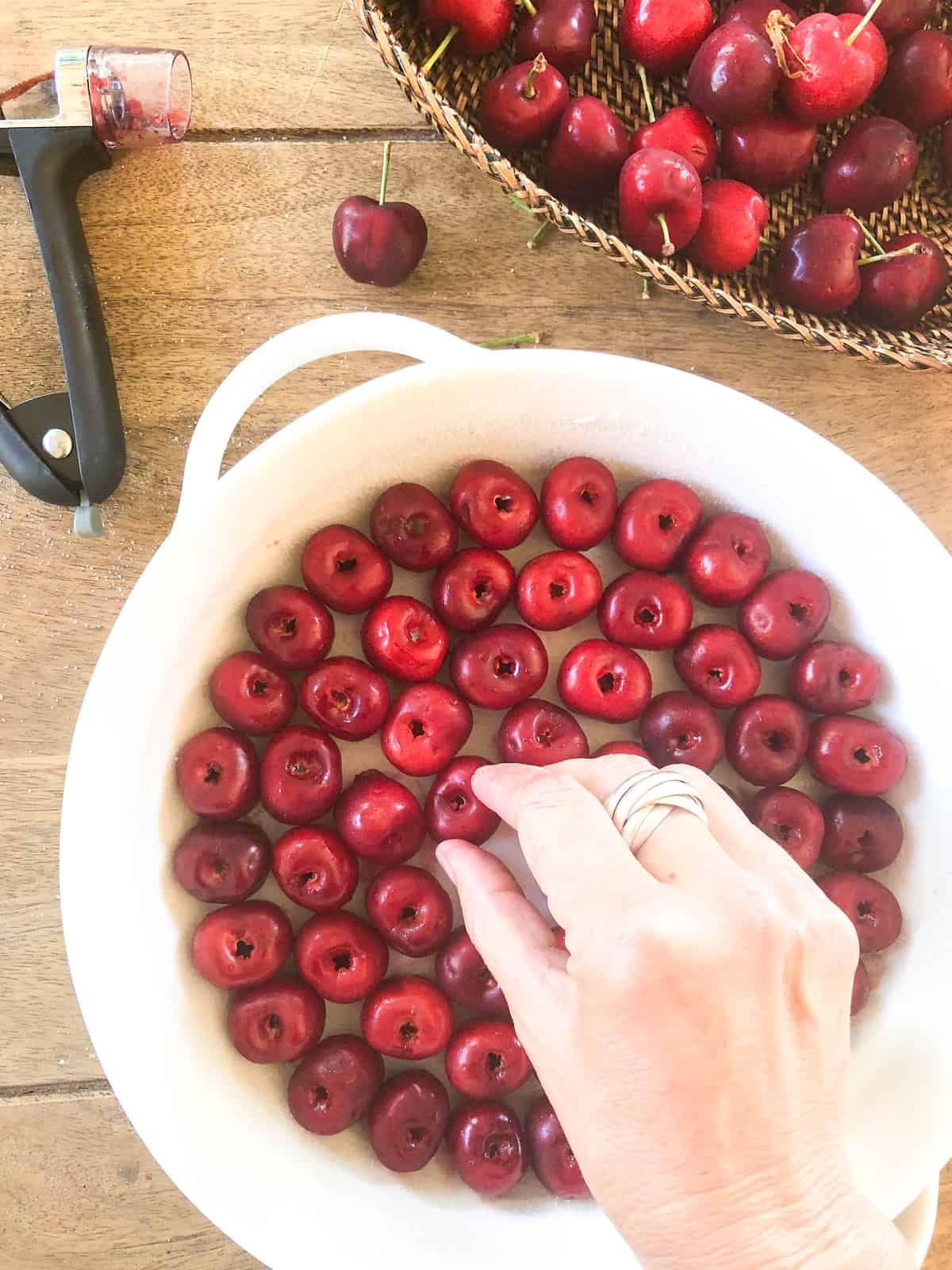 Arrange the cherries to cover the entire bottom of the baking dish.