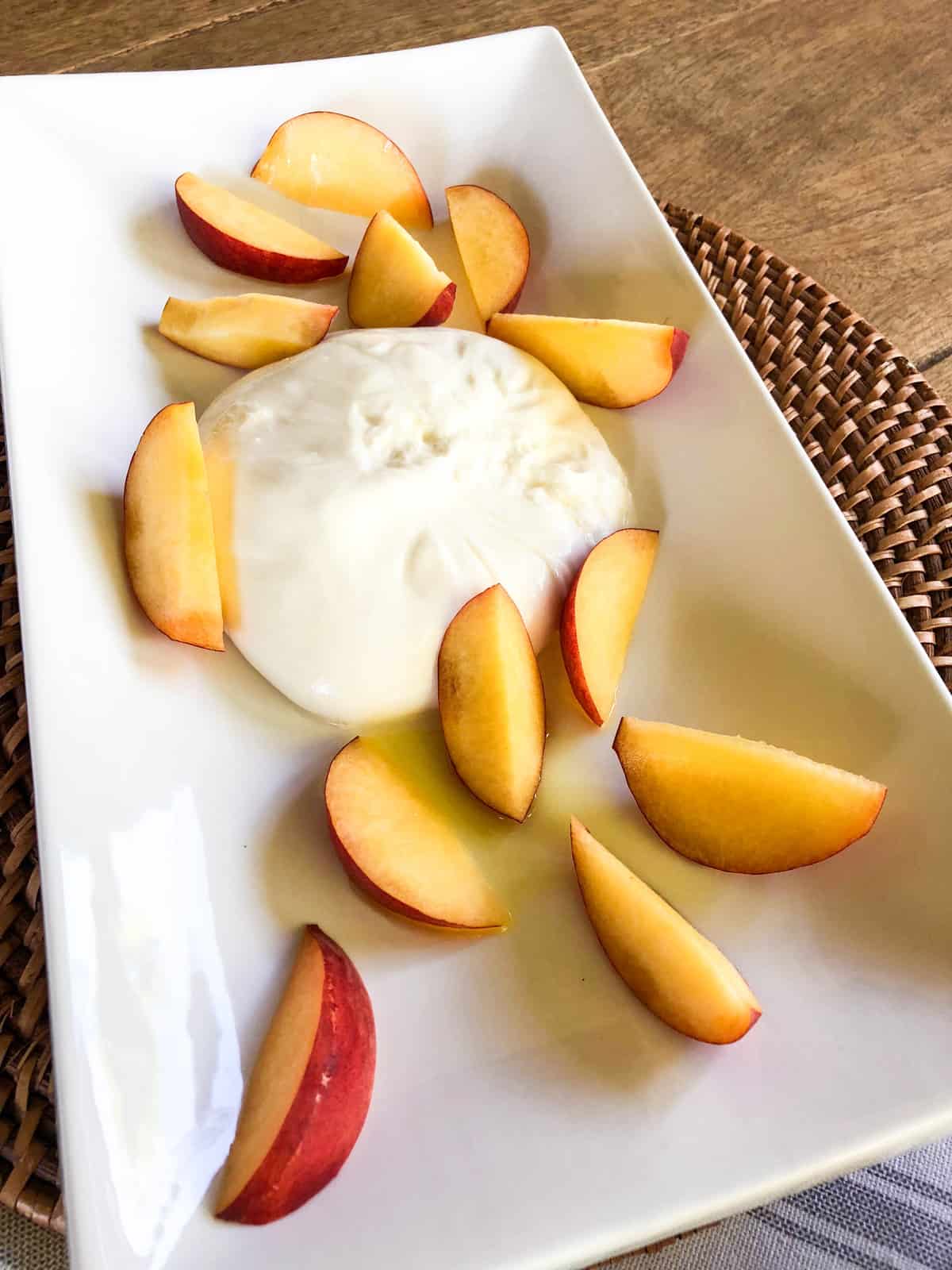 Surround by fresh, sliced peaches.