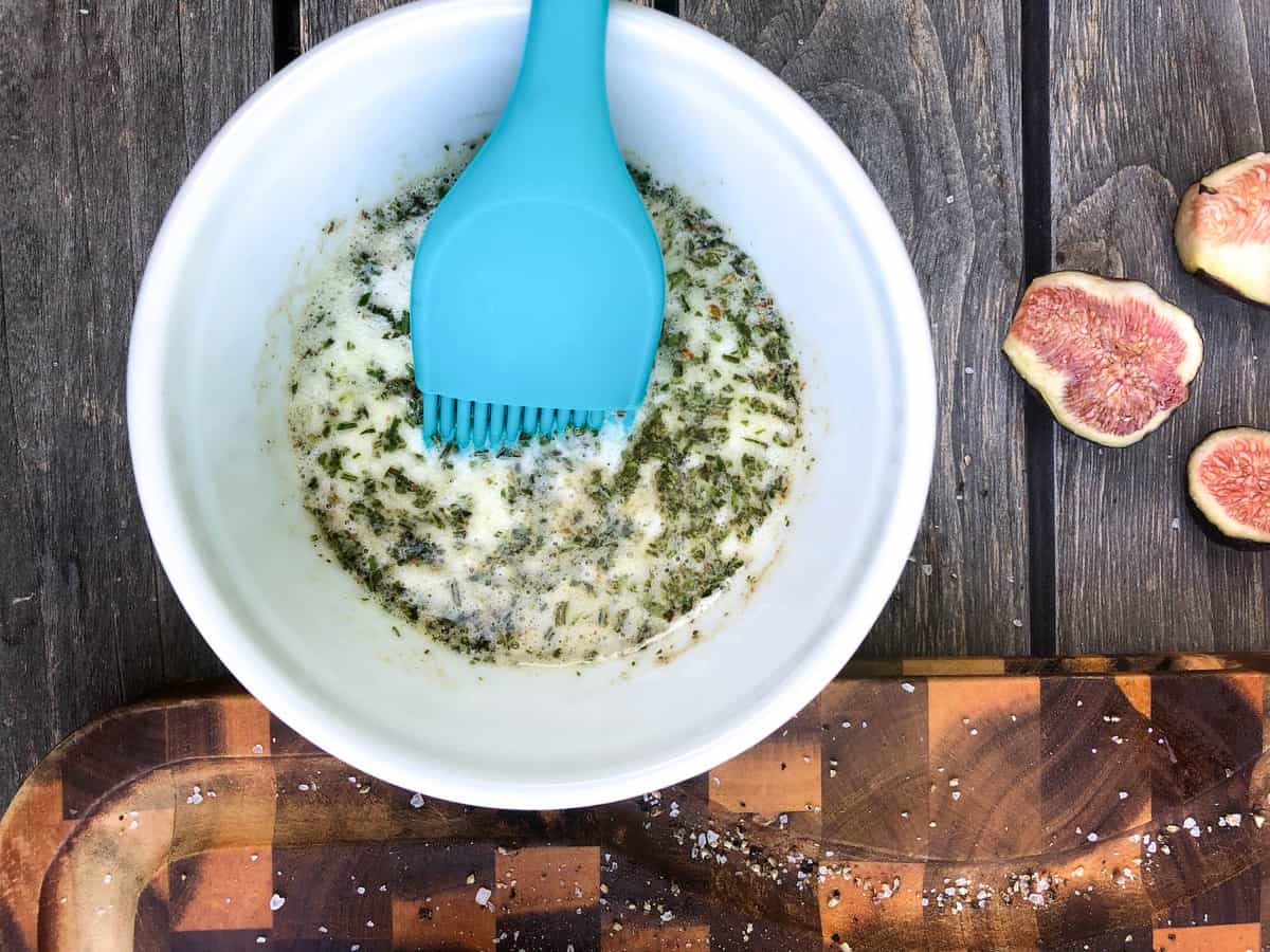 Melt a cube of butter along with fresh, chopped rosemary.