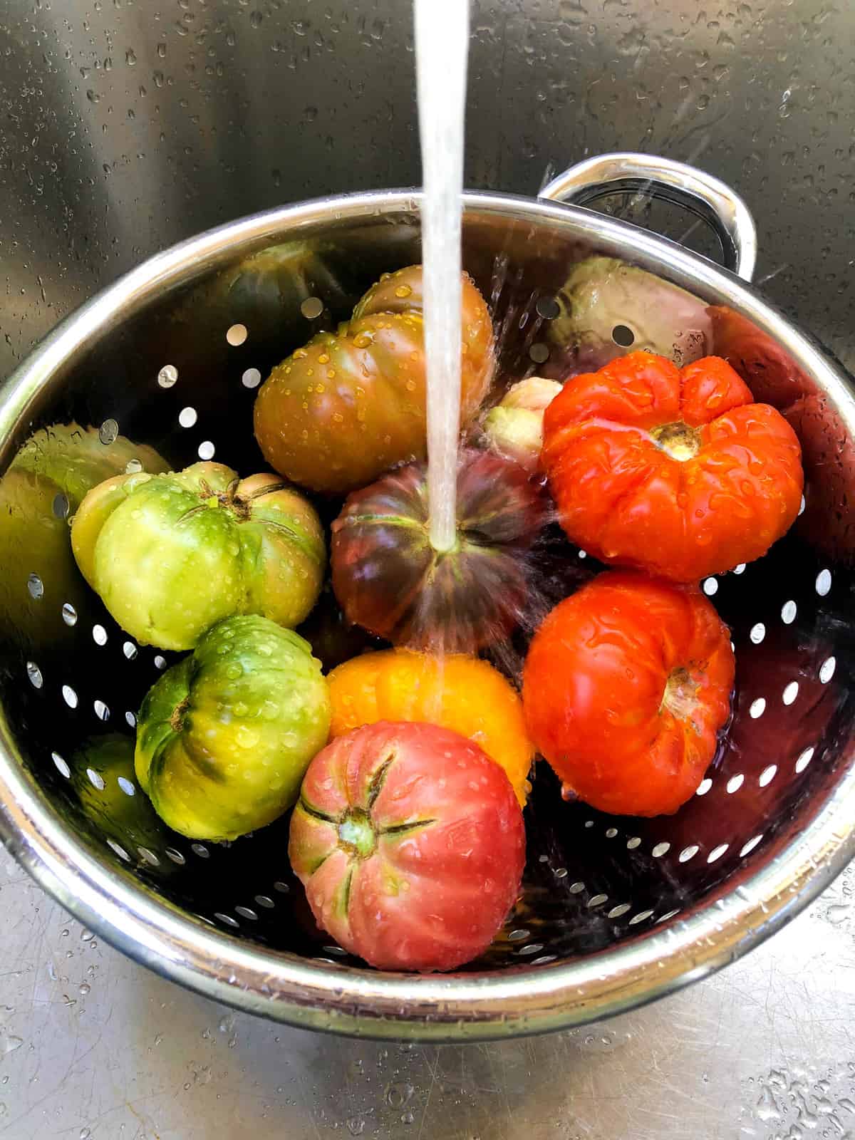 Wash heirloom tomatoes 