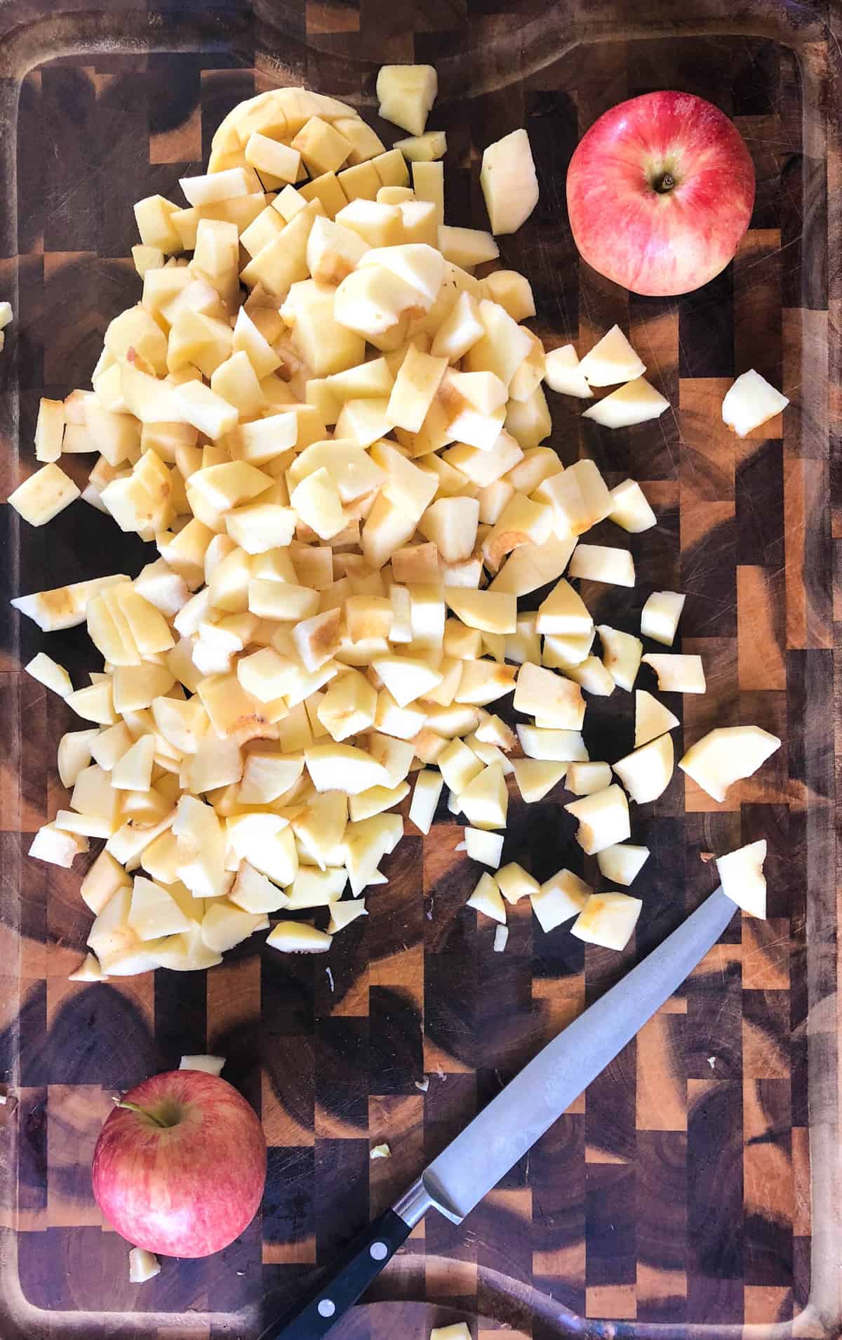 Chop the apples into similar sized pieces.