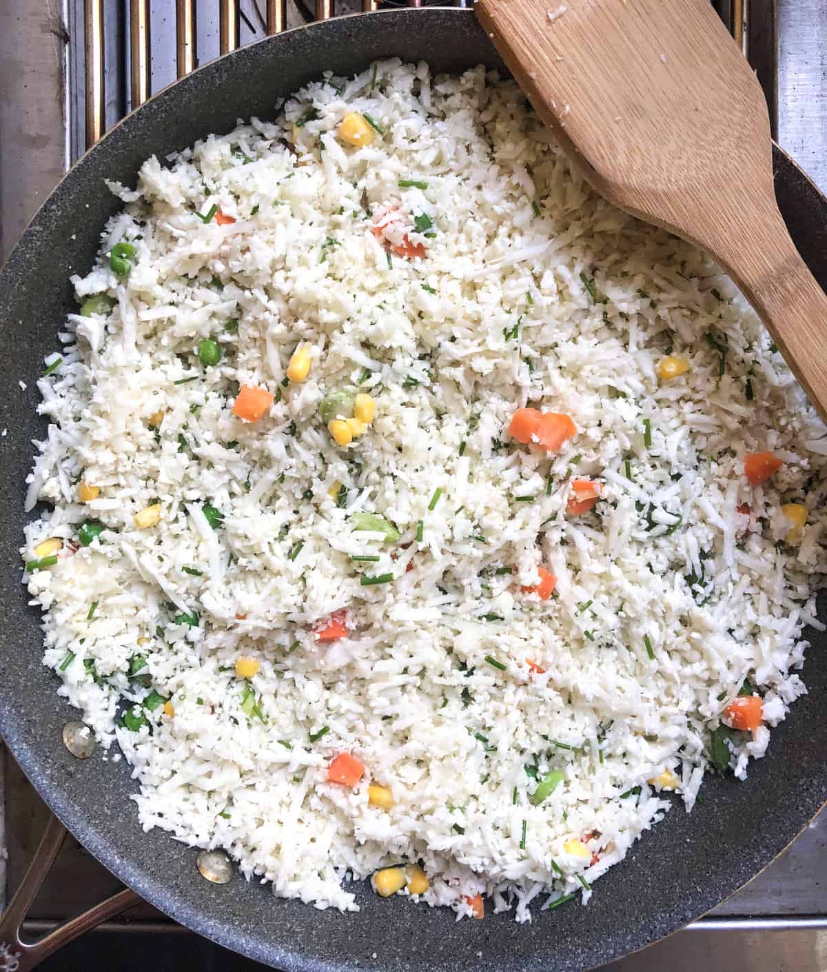 Sauté for about 5 minutes, allowing the cauliflower to soften.