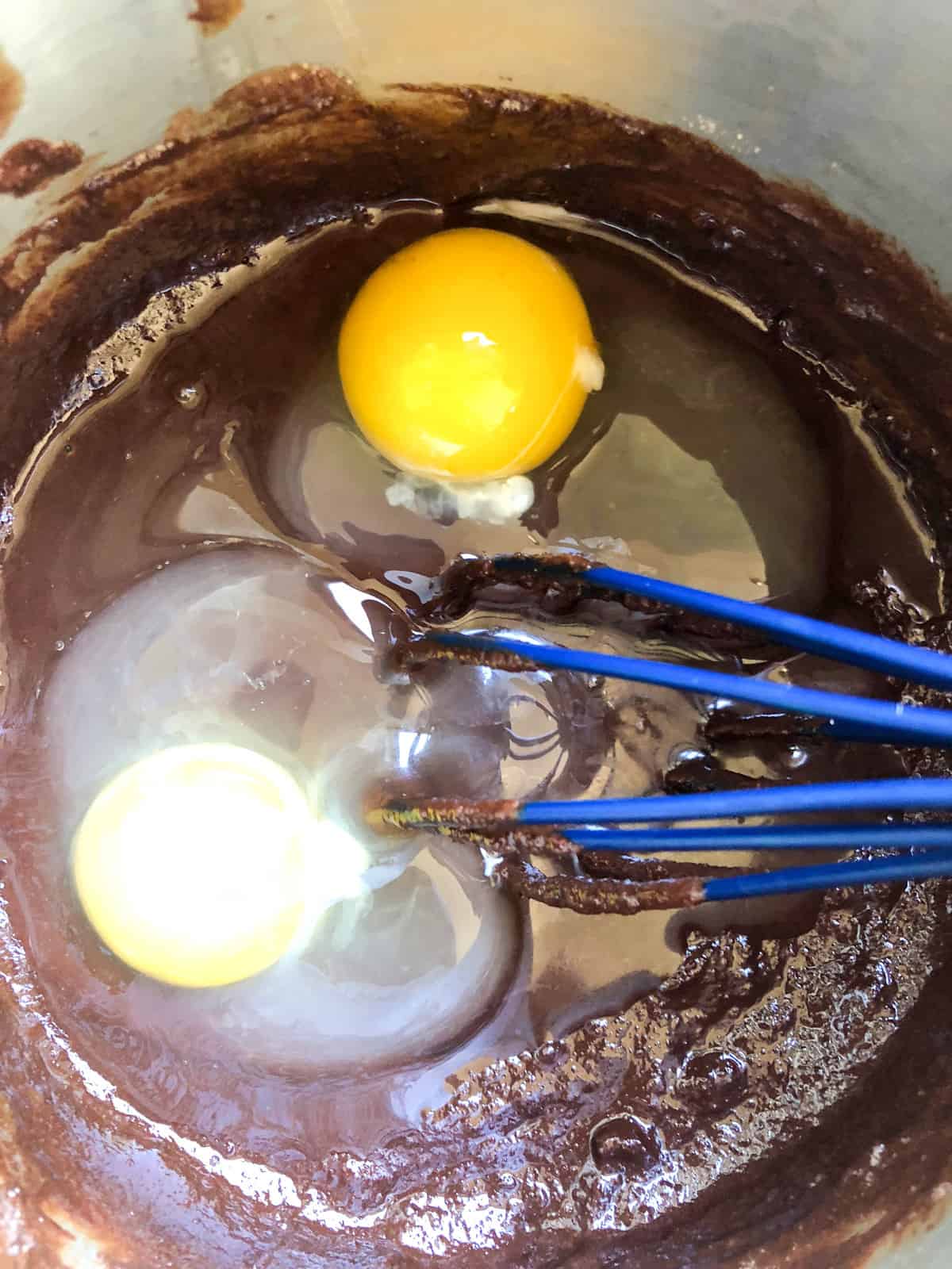 Whisk in the eggs.
