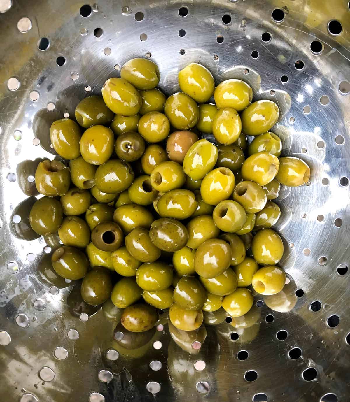 2 cans of California pitted green olives, drained.