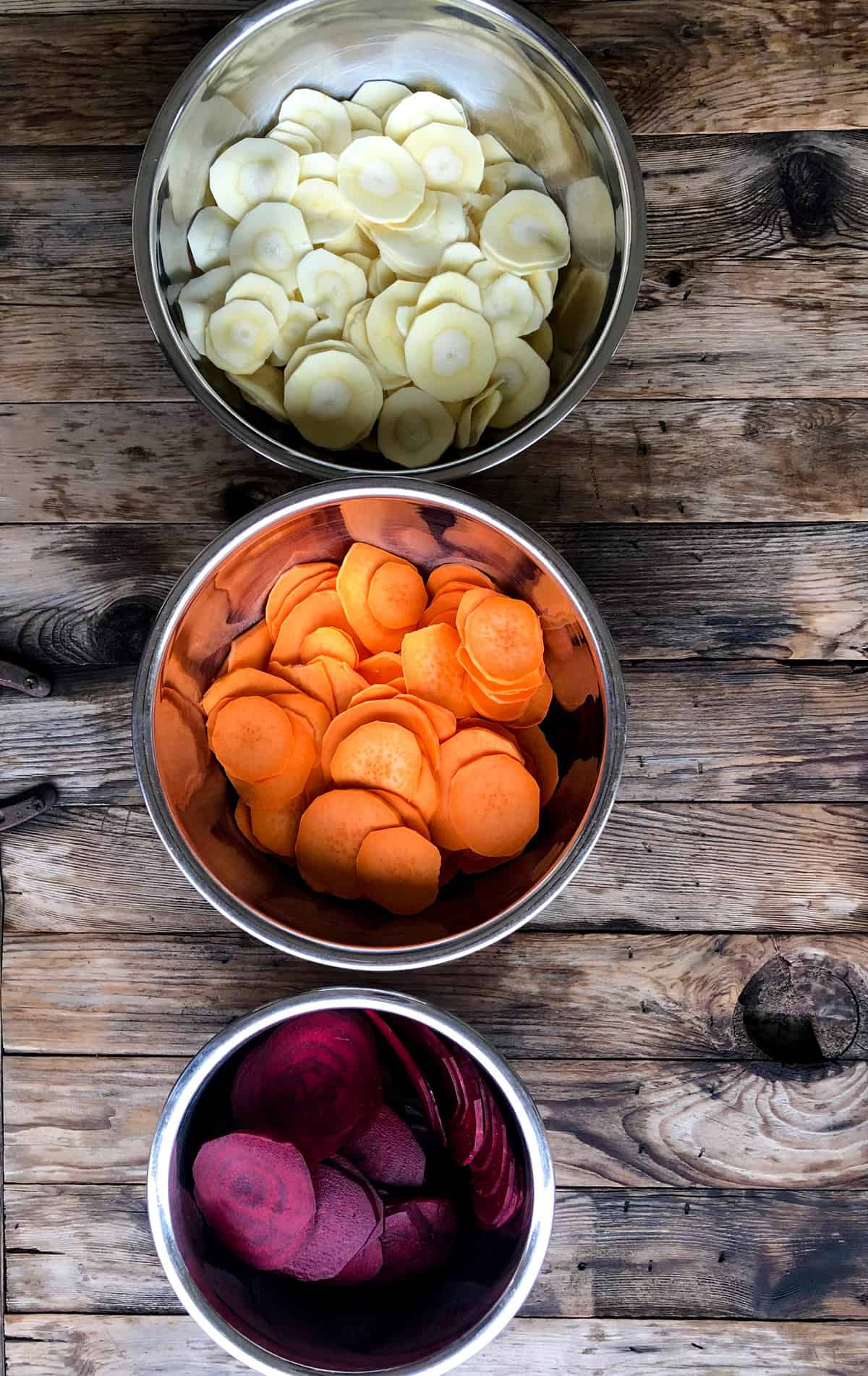 Keep each vegetable separated in it's own bowl and slice thin.