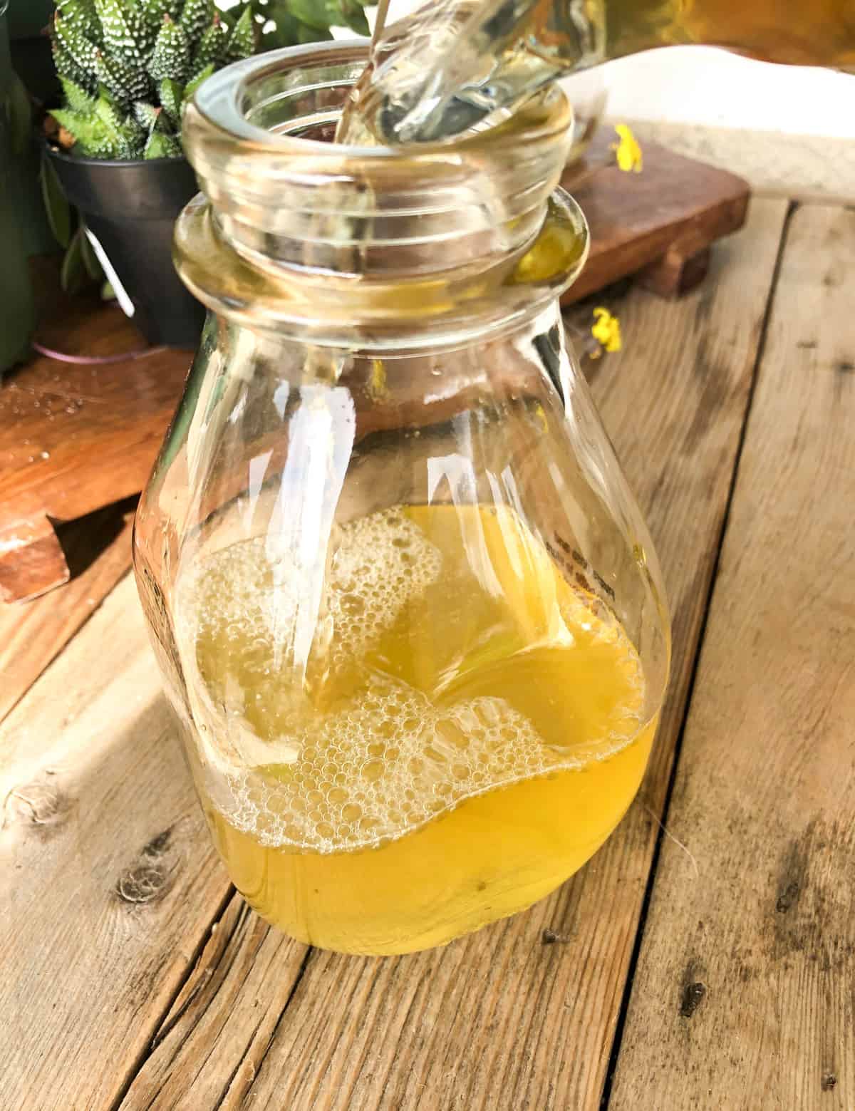 Pour in the apple cider vinegar.