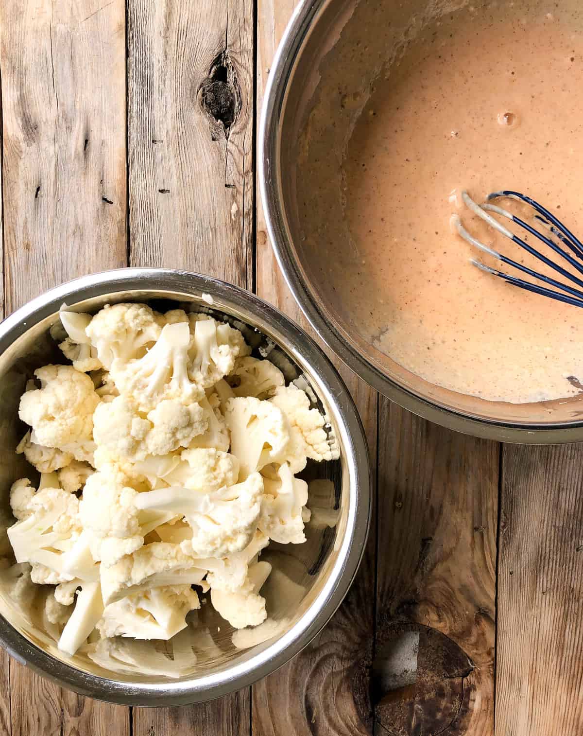 Whisk together the flour, milk, paprika, garlic powder, and salt and pepper.  