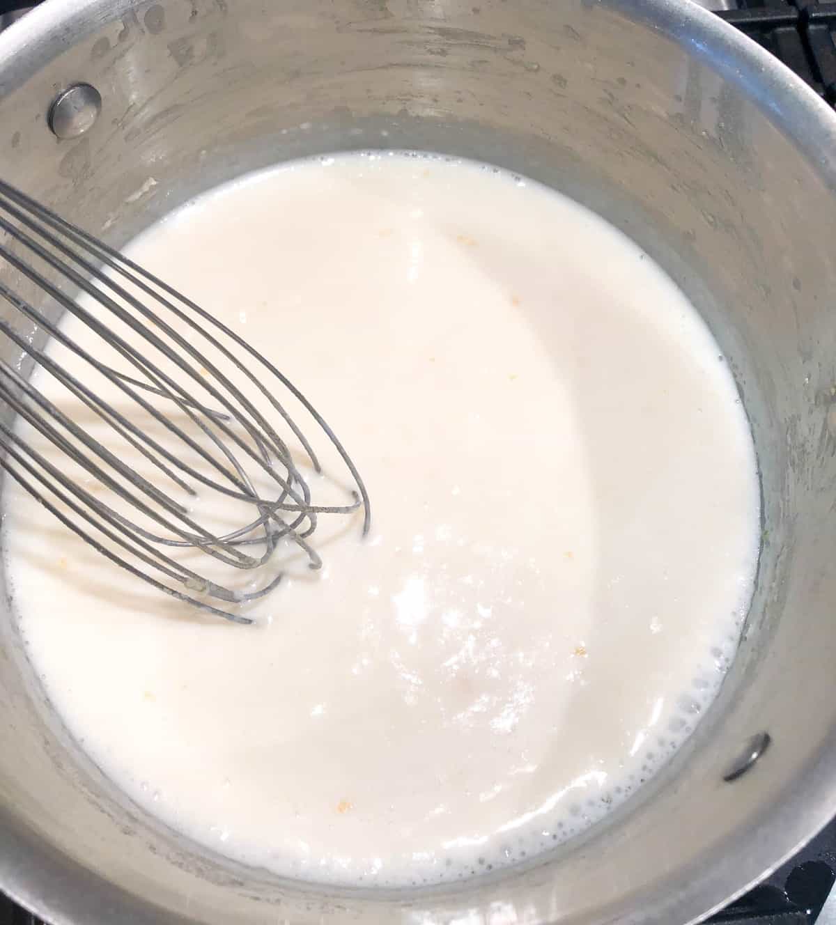 Add in the milk and stir until thick and bubbly.