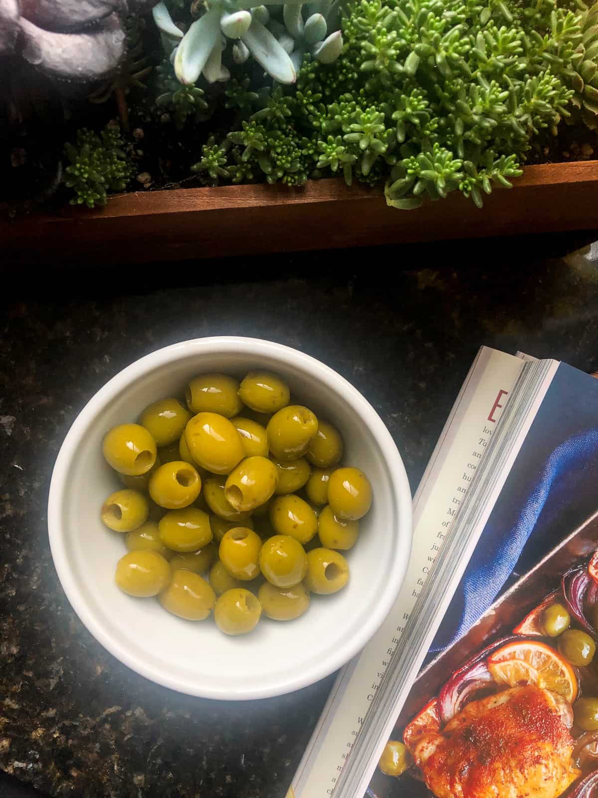 Pour in a drained can of California green olives and roast for another 5-10 minutes.