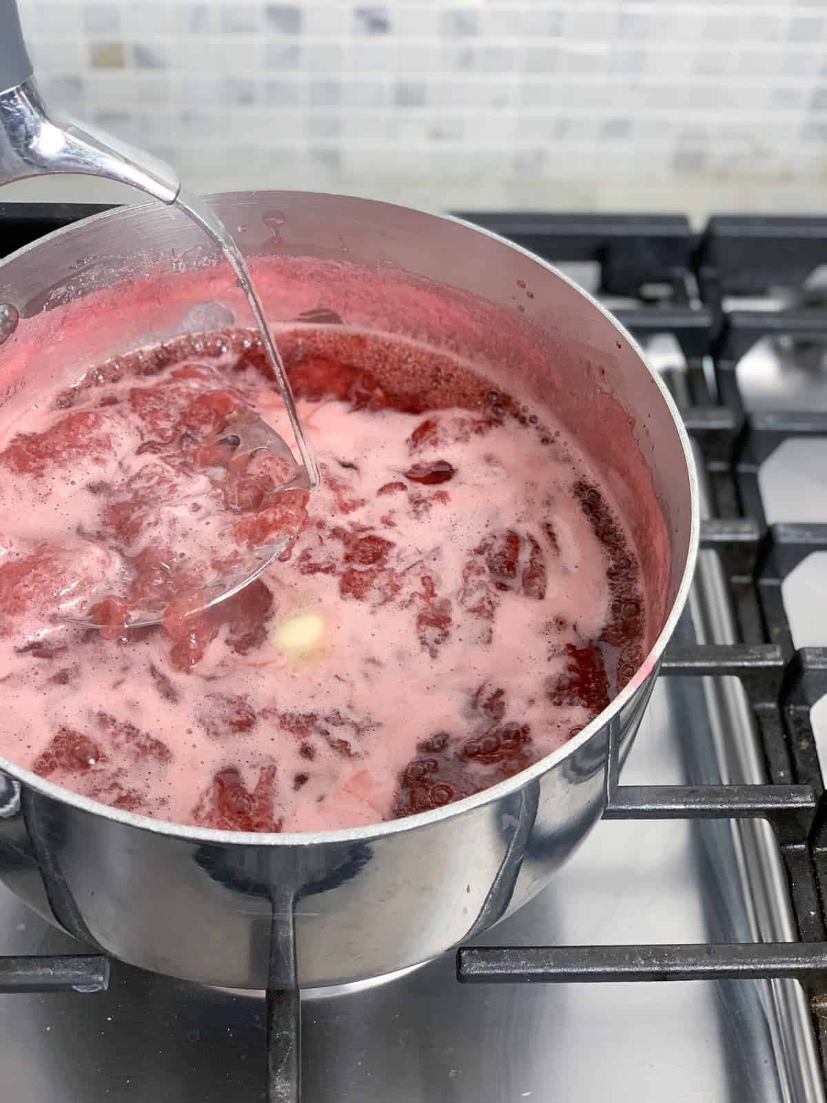 To reduce the bubbles, add a dash (1/4 teaspoon) of butter to the pan.