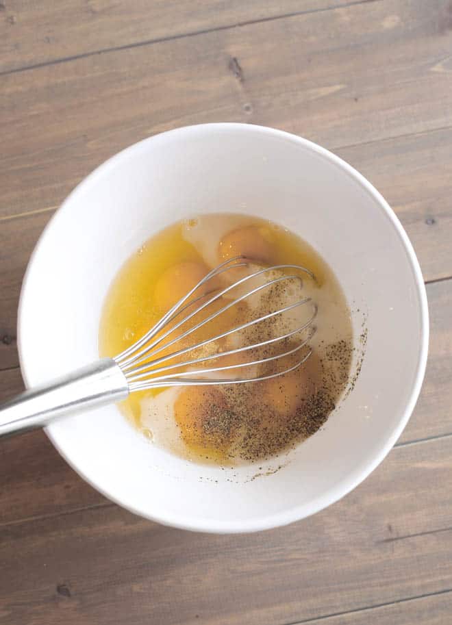 whisking eggs for egg muffin recipe