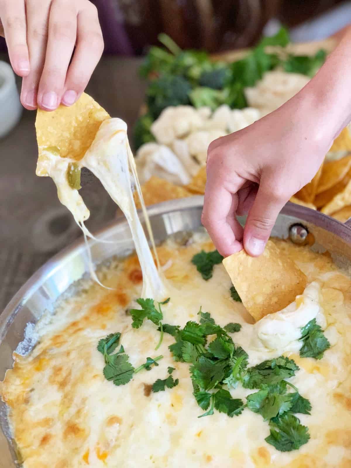 Queso Fundido recipe with chips and vegetables