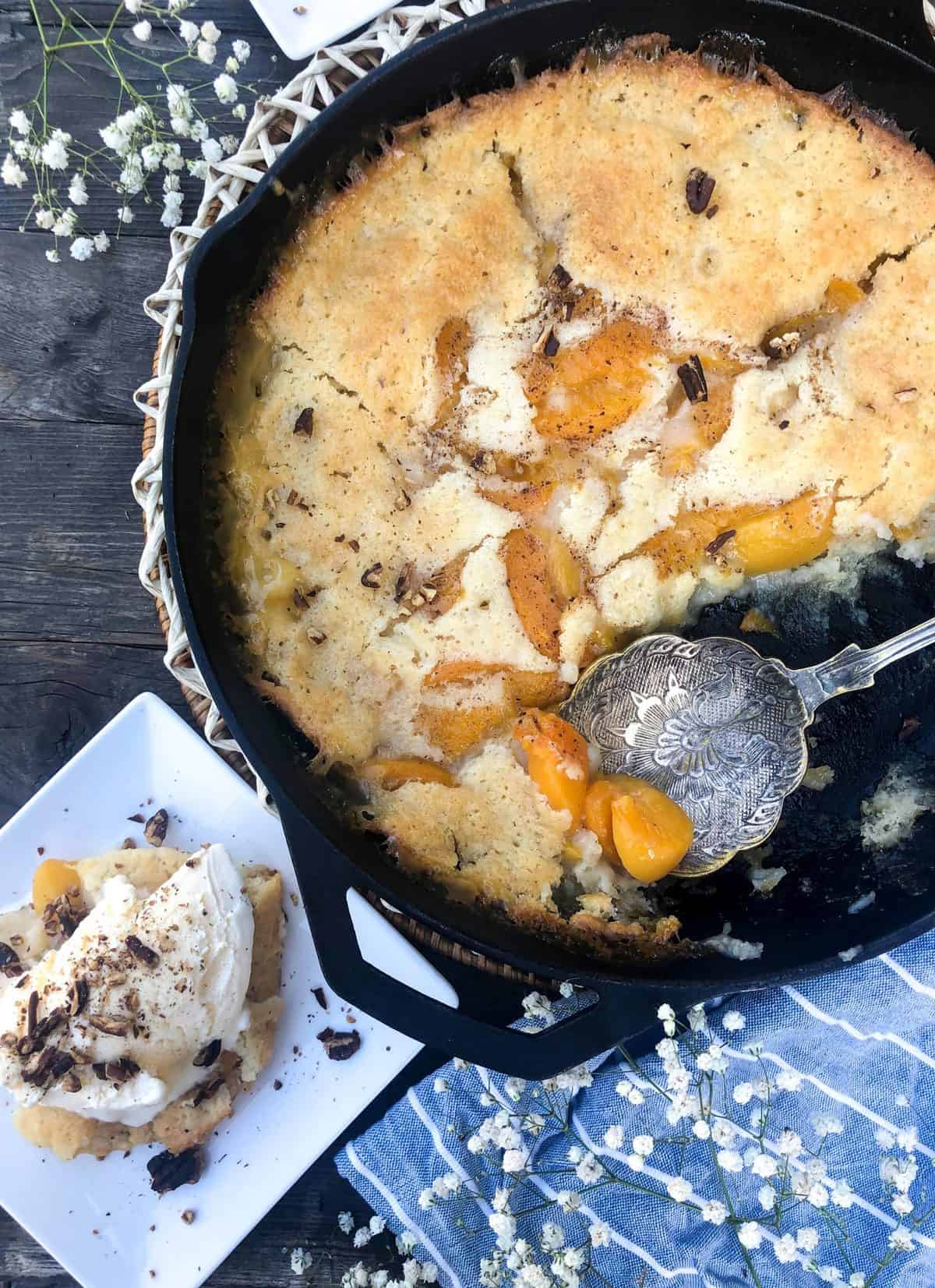 serving canned peach cobbler with ice cream