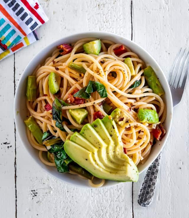 Our search for California Avocados recipes continues with this bowl of pasta tossed with tomatoes, asparagus, and avocado.