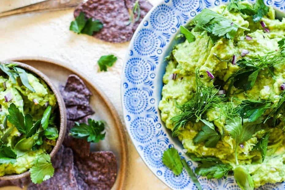 This California Avocados inspired recipes features creamy mashed avocado mixed with lime juice then topped with hand torn herbs.