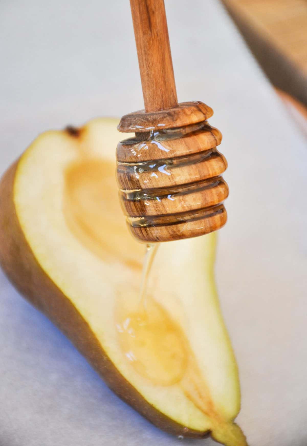 Drizzling Honey over Pear