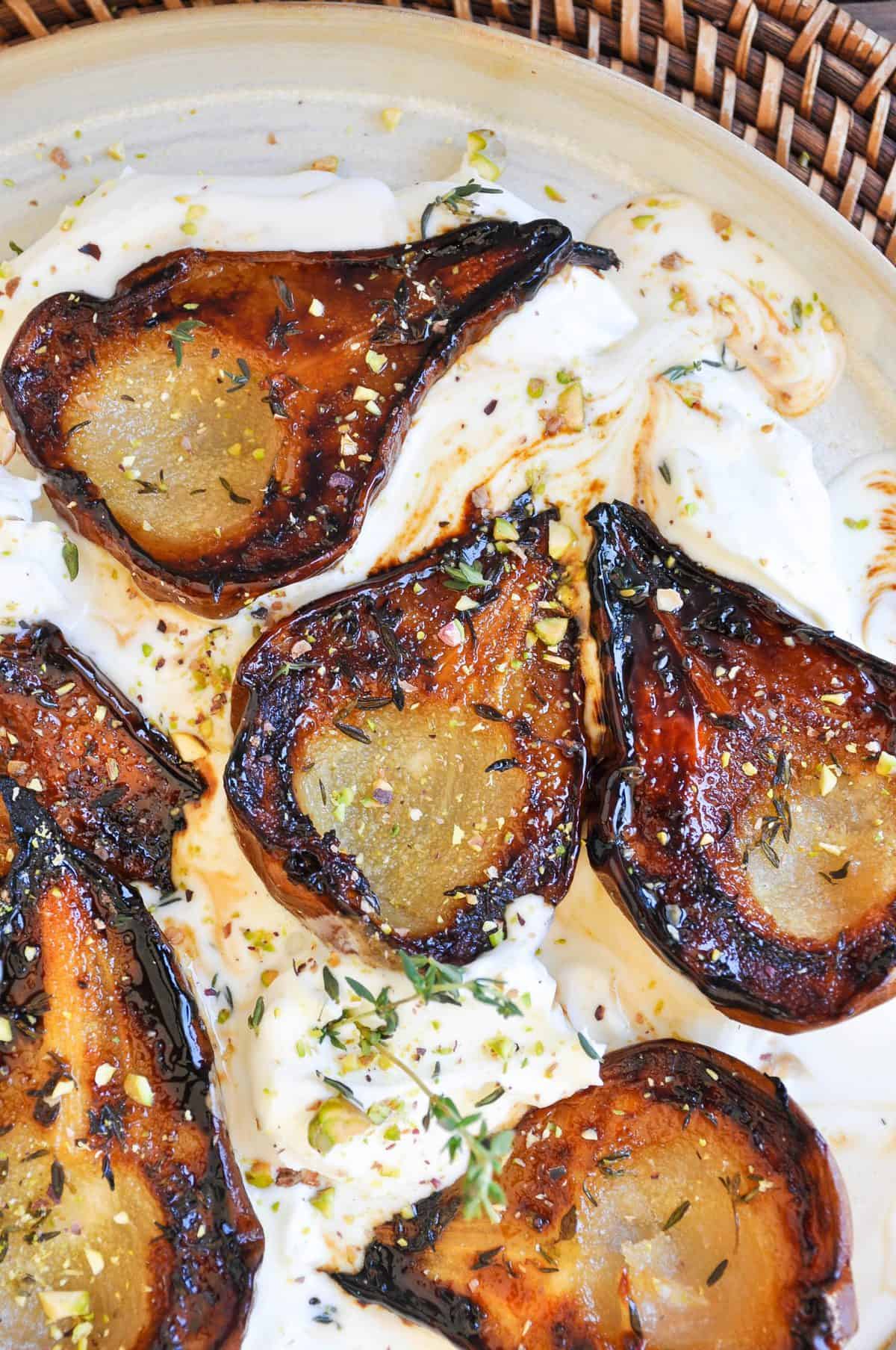 Freshly Baked Honey Thyme Roasted Pears with Maple Cream Close Up