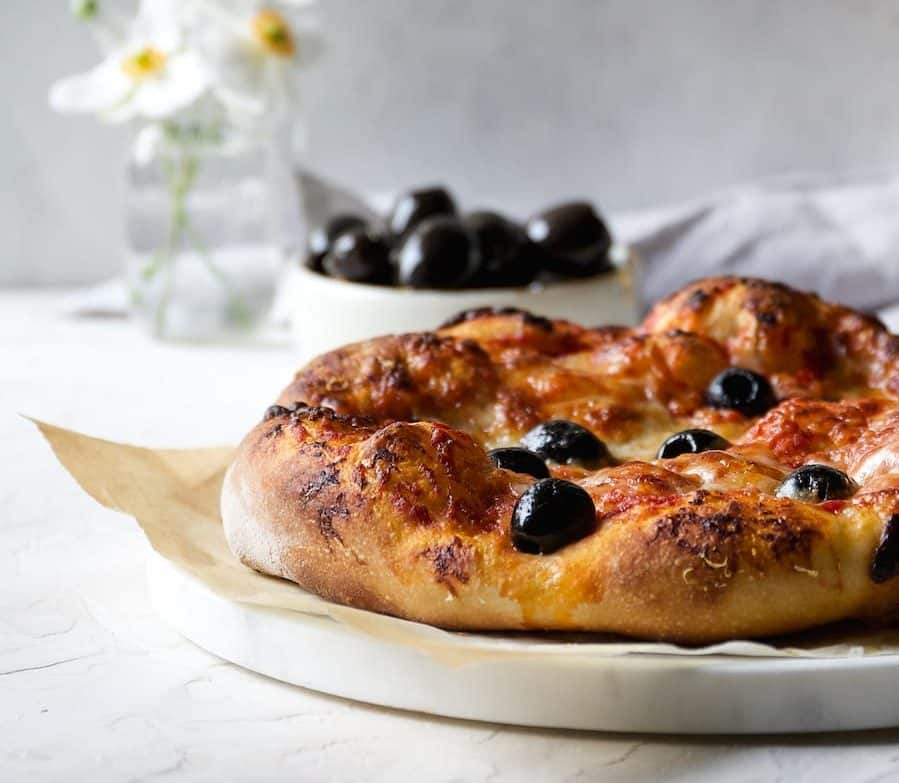 Beer Crust pizza recipe using marinated california ripe olives