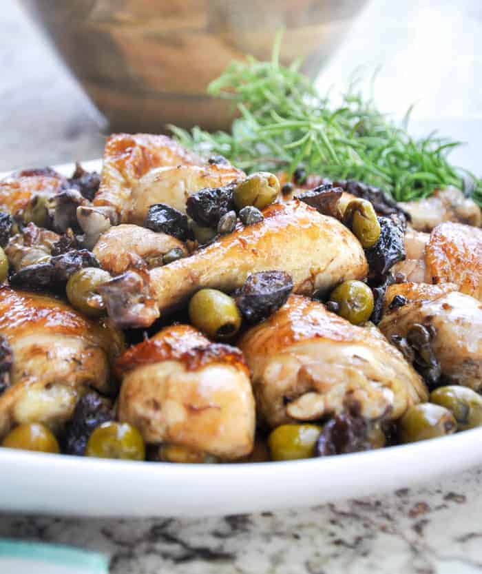 How to Make Roasted Chicken Legs in the Oven, Marbella Style with prunes, olives, and capers