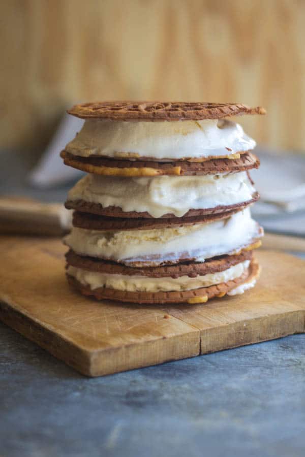 pumpkin pizzelle ice cream sandwiches in a stack