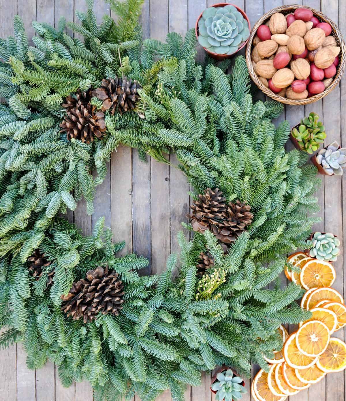 Fresh Wreath with Dried Citrus, Whole Nuts and Succulents