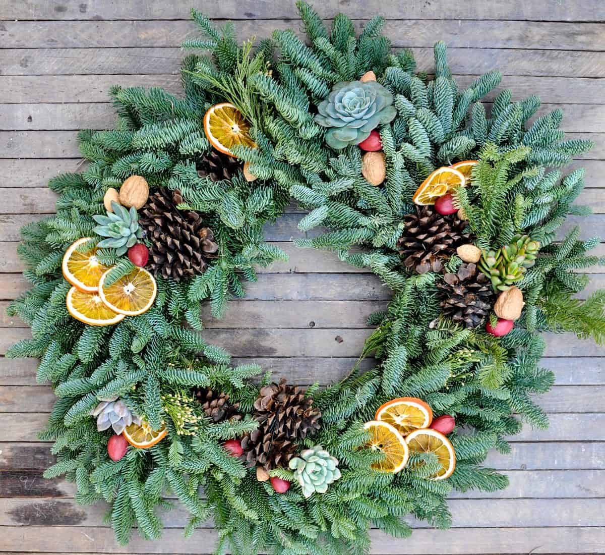 Fresh Wreath with Dried Citrus, Whole Nuts and Succulents