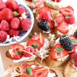 berry crostini with strawberries, blueberries and blackberries