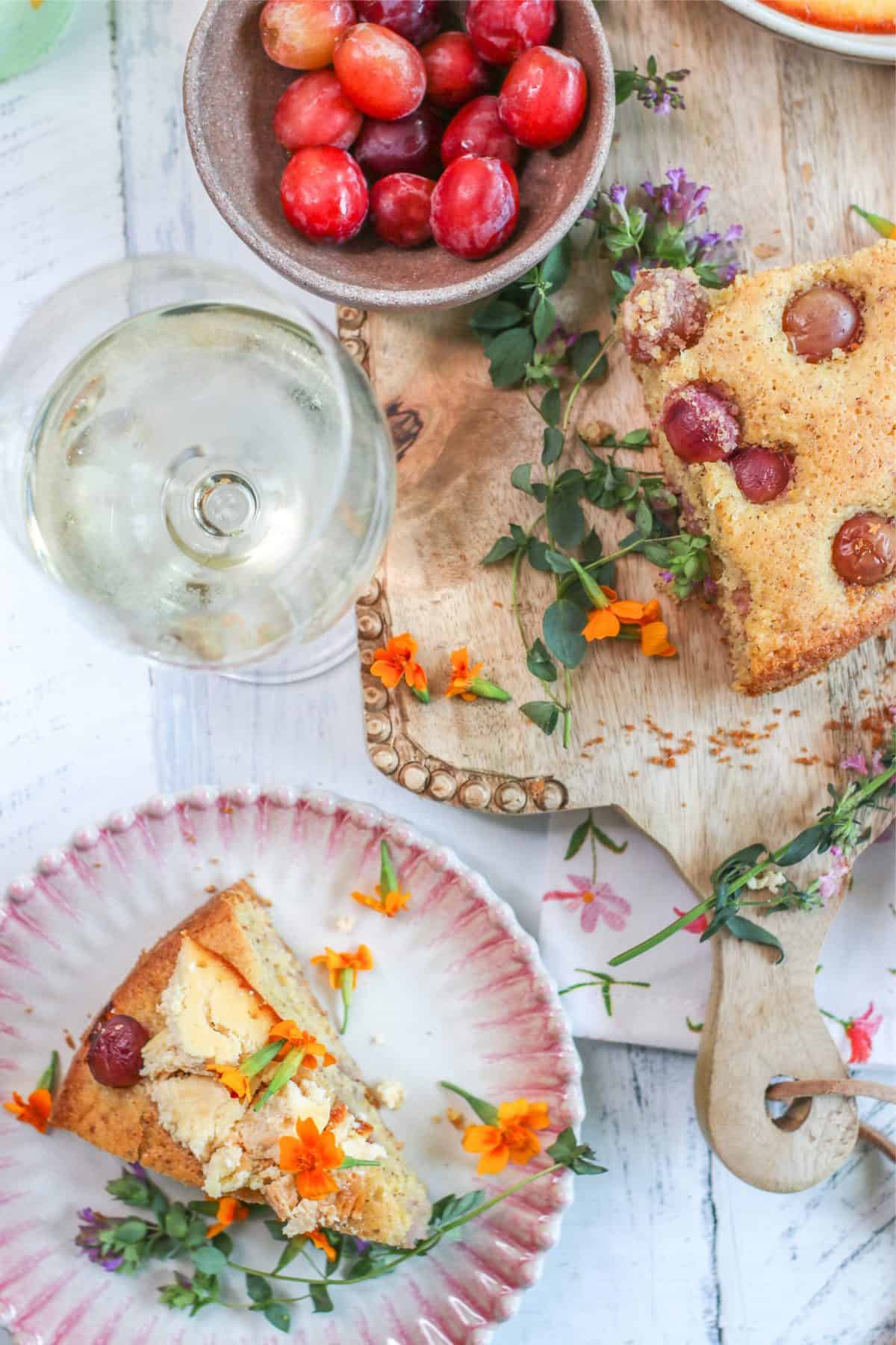 Grape cake with baked orange ricotta