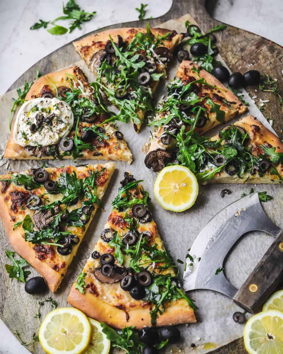 https://californiagrown.org/wp-content/uploads/2021/04/Cheesy-Olive-Pizza-with-Mushrooms-and-Burrata-1-1200x1500.jpg