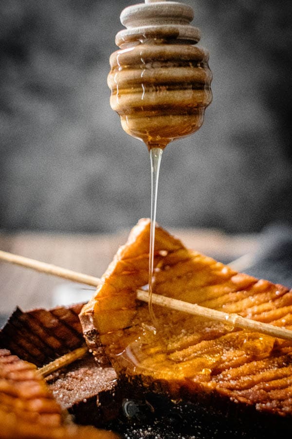 This is how to use honey, drizzle it over Hasselback Sweet Potato Skewers!