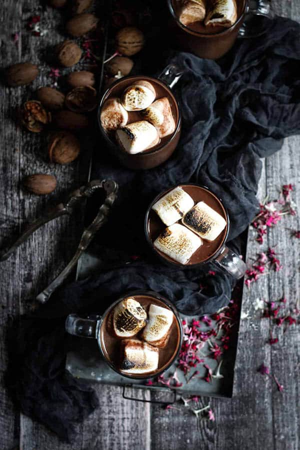 3 glasses of Red Wine Hot Chocolate topped with toasted marshmallows.