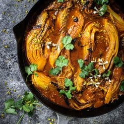 best Napa Cabbage - melting napa cabbage with red sauce in a skillet