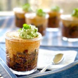 Super Easy Taco Pie with Avocado Crema is served in single portion jars