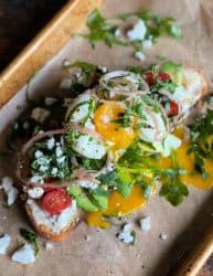 avocado toast recipe by nocrumbsleft with fried egg and olive oil