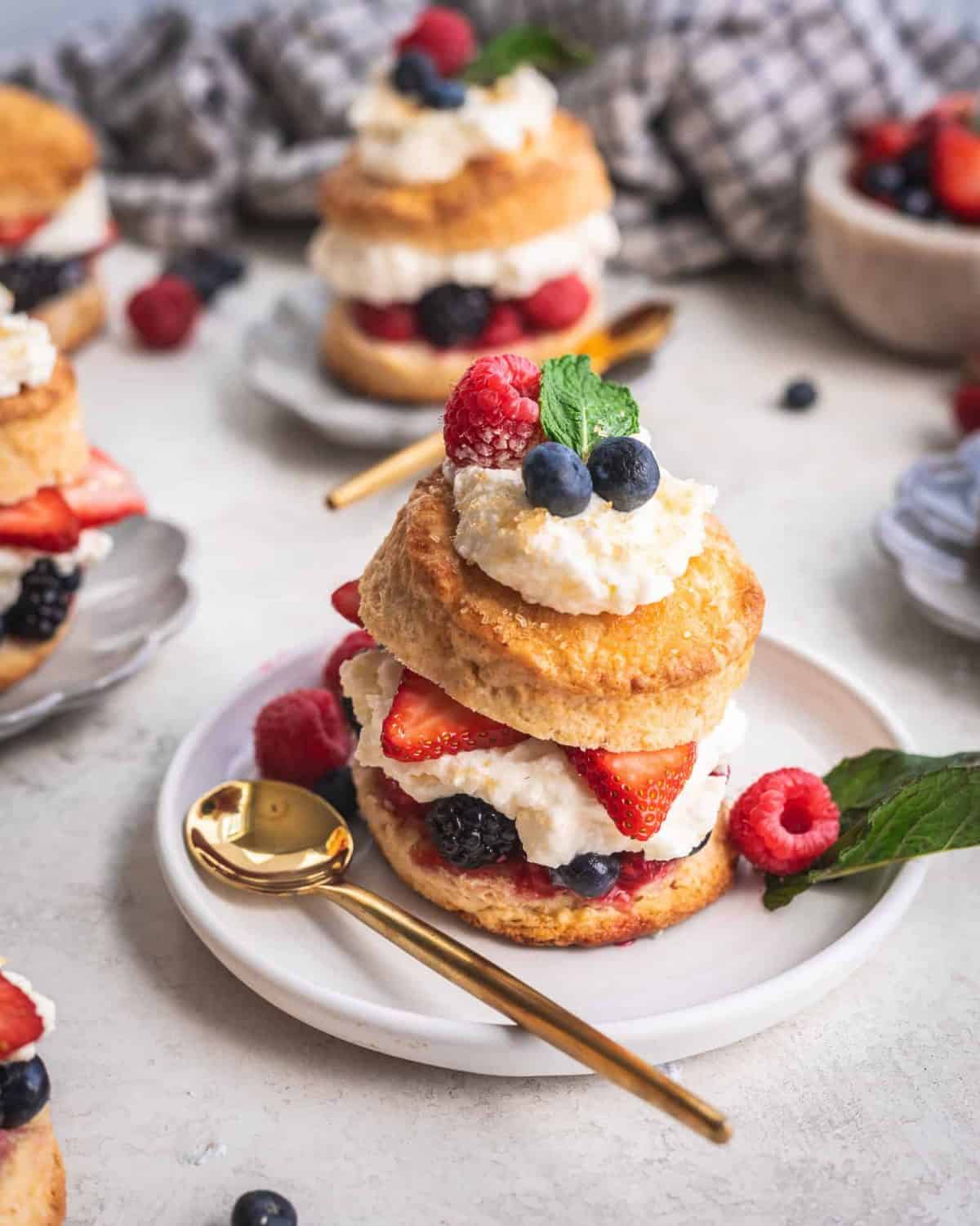 Two rounds of buttery shortcake split and topped with whipped cream and mixed berries. This red, white and blue desserts is one of our favorites! 