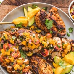 Honey Garlic Chicken with Peach Salsa on a plate from Britney Breaks Bread