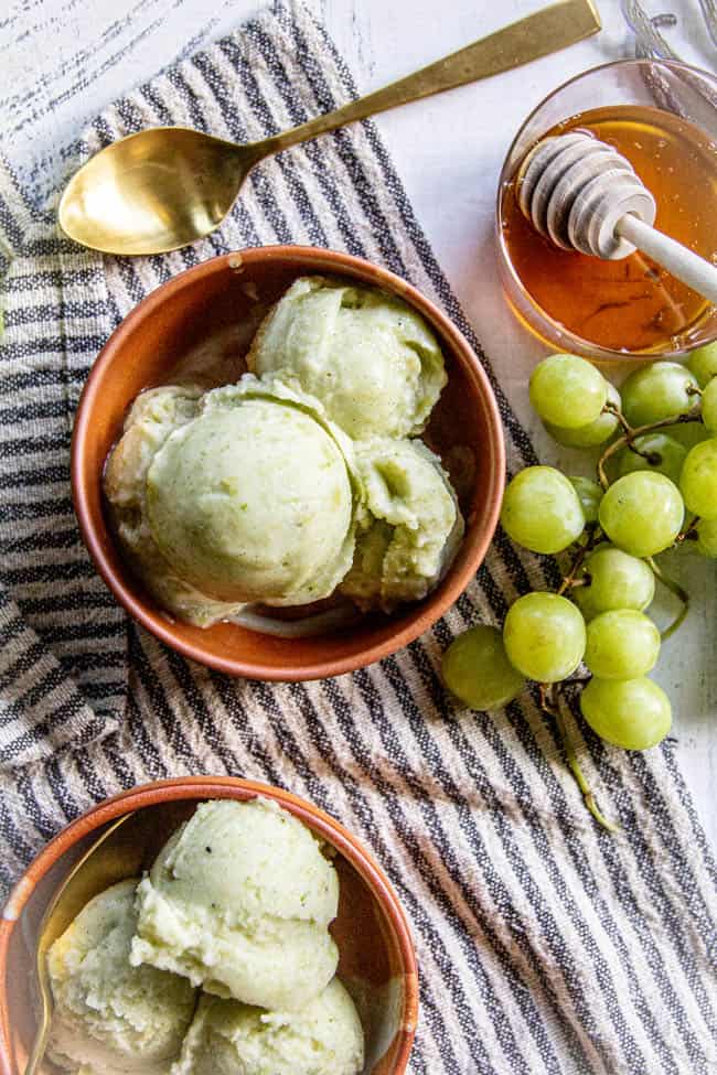 Two bowls of green grape nice cream