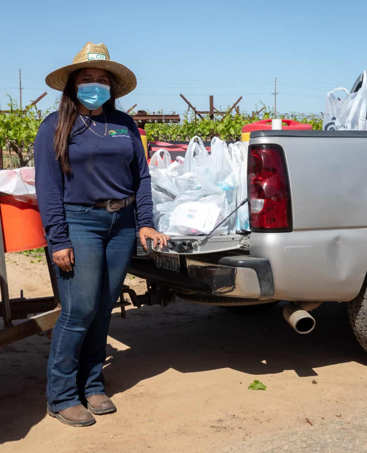 California Farmworker Foundation in the fields - providing PPE and information about scholarships