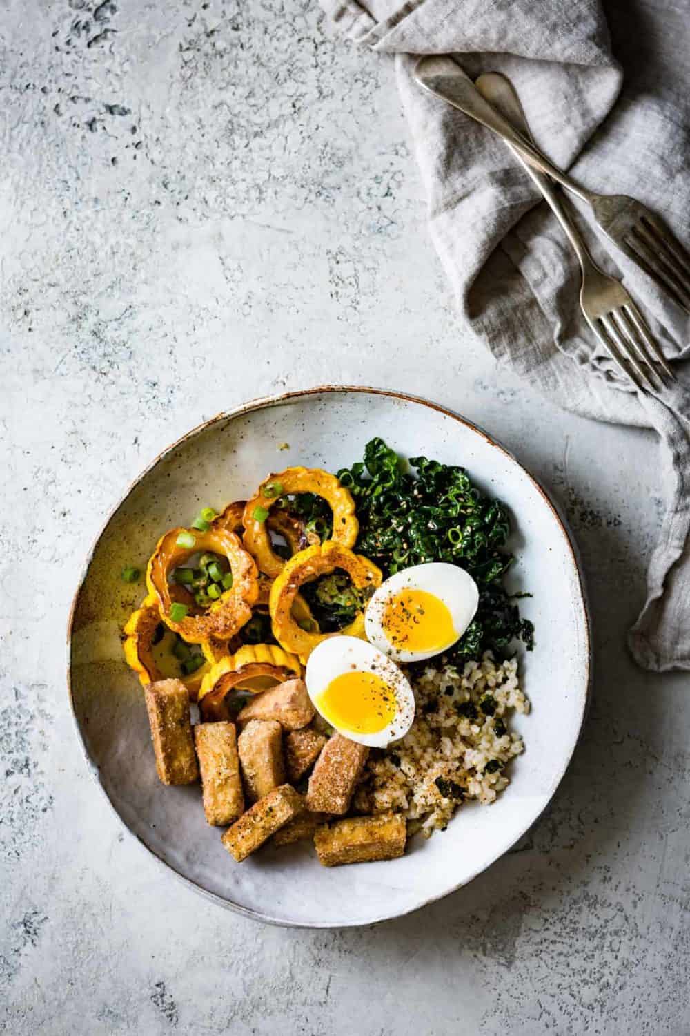 Fall Brown Rice Veggie Bowls with Crispy Tofu, Roasted Squash, and Miso Butter »